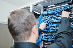 young it engeneer in datacenter server room